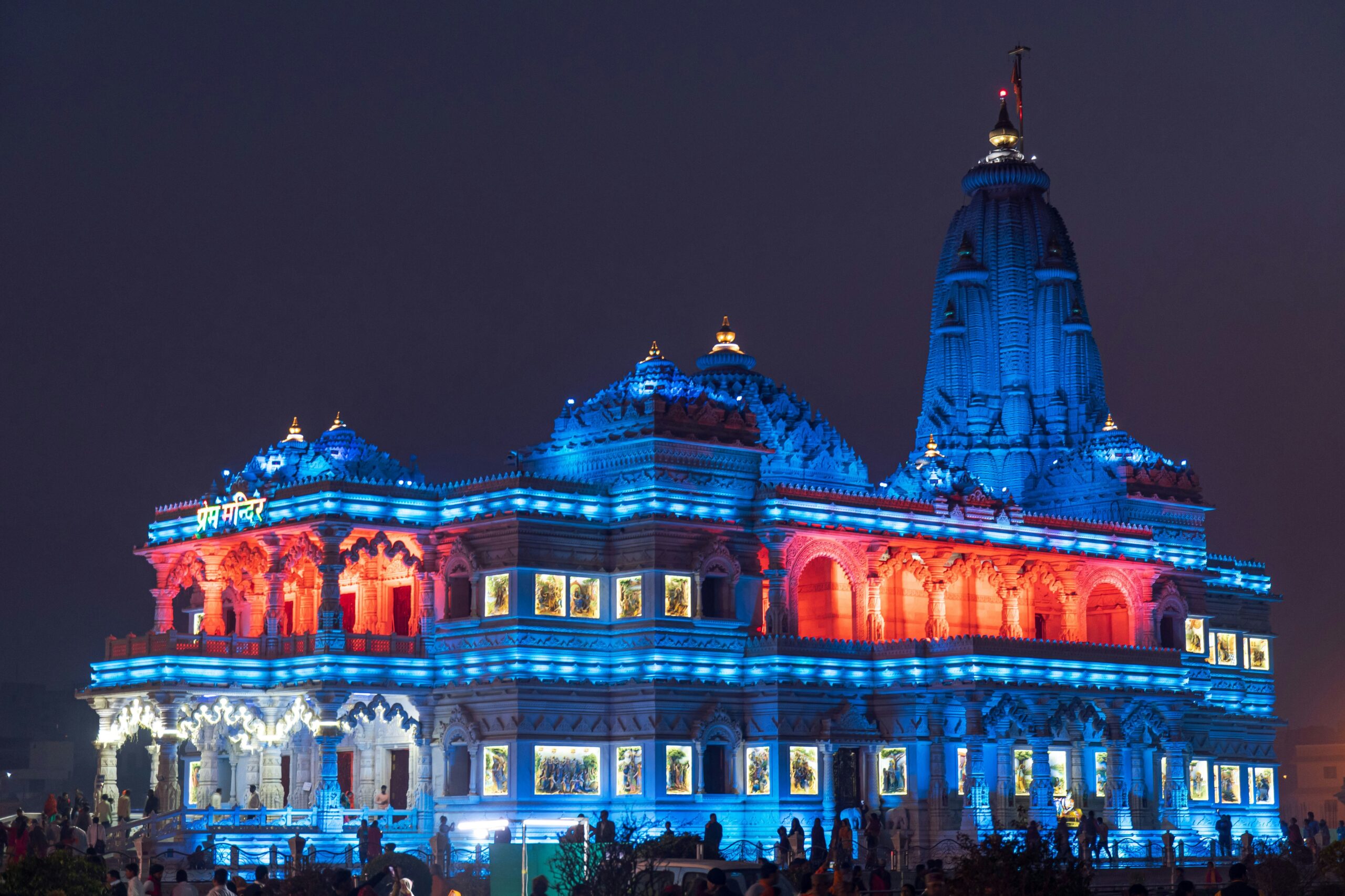 Prem Mandir Vrindavan illuminated with colourful lights at night