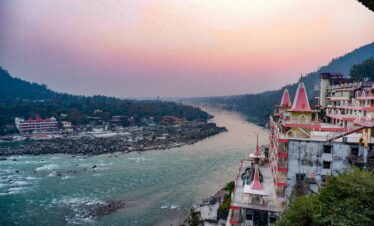 Sunset view of Ganges River and temples in Rishikesh Uttarakhand