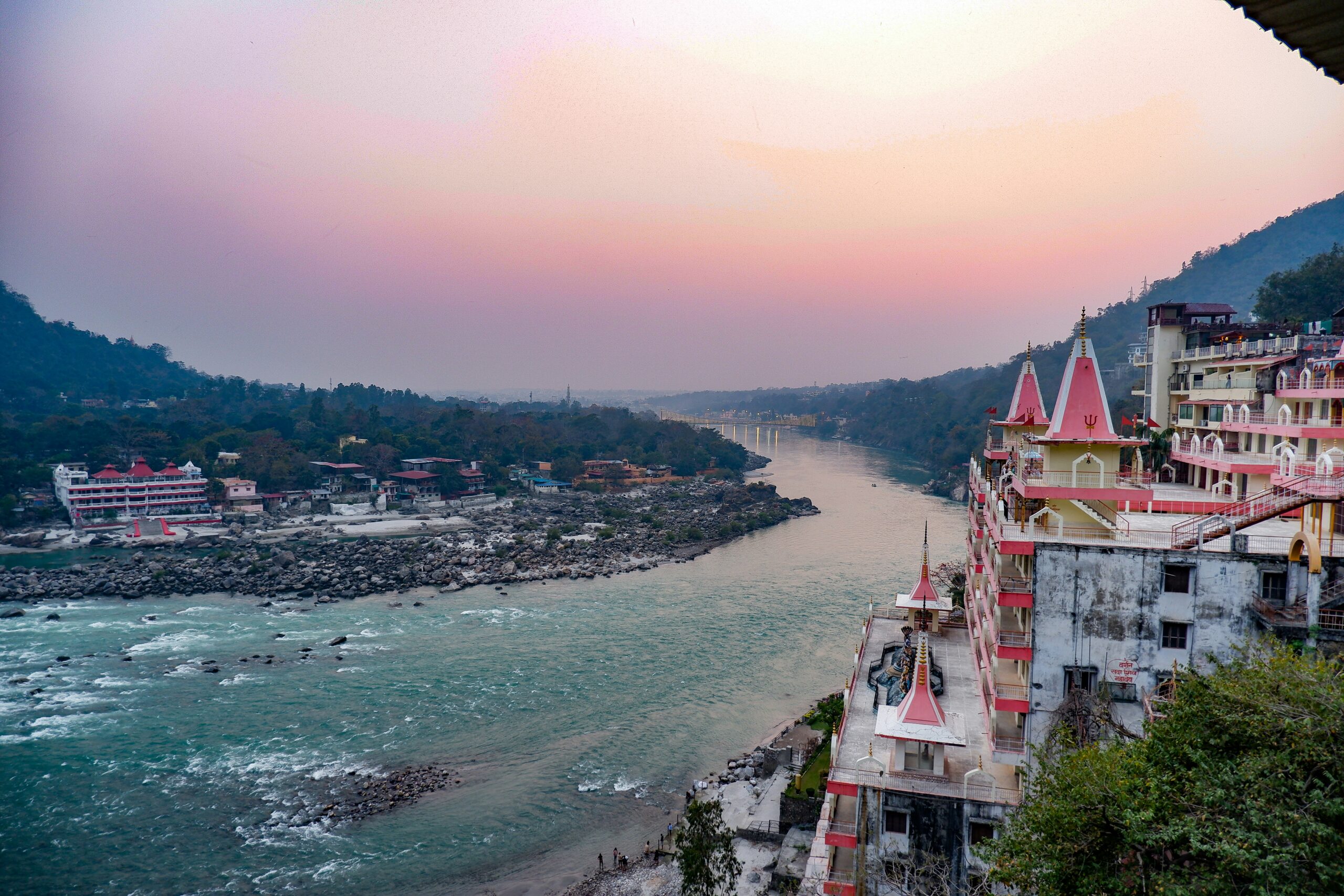Sunset view of Ganges River and temples in Rishikesh Uttarakhand